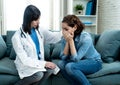 Woman patient receiving bad news. Friendly Doctor comforting and support sad patient with empathy Royalty Free Stock Photo