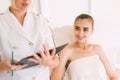 Woman patient smiling at doctor. Royalty Free Stock Photo