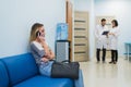 Woman patient waiting at hospital Doctors Waiting Room Royalty Free Stock Photo