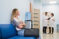 Woman patient waiting at hospital Doctors Waiting Room Royalty Free Stock Photo