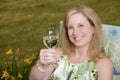Woman on Patio with Wine Toasting Viewer
