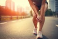 A woman pauses on the side of the road to stretch her legs, enhancing her fitness and flexibility, Woman experiencing knee pain