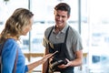 Woman paying bill through smartphone using NFC technology Royalty Free Stock Photo