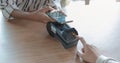 Woman paying bill through smartphone using NFC technology in a coffee. customer paying through mobile phone using contactless Royalty Free Stock Photo