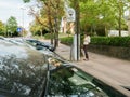 Woman paying for parking at the German Parking ticket payment ma Royalty Free Stock Photo