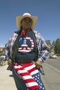 Woman with a Peace-American t-shirt protests President George W. Bush in Tucson, AZ at a political rally Royalty Free Stock Photo