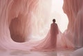Woman in peachy pink veil in the ice cave.