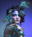 Woman in peacock image.