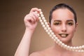 The woman with pearl necklace isolated on white Royalty Free Stock Photo