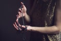 Woman with pearls in her hands Royalty Free Stock Photo