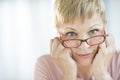 Woman Peering Over Her Eyeglasses