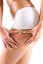Woman with perfect body checking cellulite Royalty Free Stock Photo