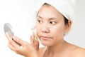 Woman with perfect health skin of face and bath towel on head Royalty Free Stock Photo