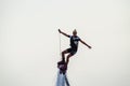 Woman performing Flyboard show at the port of Kalamata city, Greece