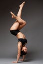 Woman performing handstand Royalty Free Stock Photo