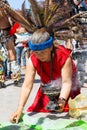 Woman performing traditional Mayan ritual