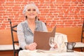 Woman perusing a restaurant menu Royalty Free Stock Photo
