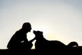 Woman Petting Dog Outside Silhouette Royalty Free Stock Photo