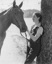 Woman petting horse Royalty Free Stock Photo