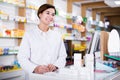 Pharmacist ready to assist in choosing at counter