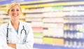 Woman pharmacist working at pharmacy. Royalty Free Stock Photo
