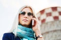 Fashion business woman in sunglasses calling on the cell phone Royalty Free Stock Photo