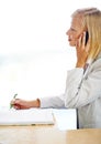 Woman, phone call and receptionist writing notes, listening and talking to contact. Cellphone, notebook and female