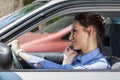 Woman on phone in car Royalty Free Stock Photo