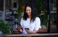 Woman, phone and credit card with smile for ecommerce, online shopping or purchase at coffee shop. Happy female shopper Royalty Free Stock Photo