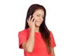 Woman on the phone with a gesture of negativity on her face