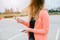 Woman with phone and power bank playing the mobile games Royalty Free Stock Photo