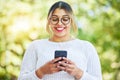 Woman, phone and texting in park with smile, online date and communication on web chat in summer. Student girl