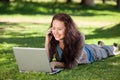 Woman phoning in the park