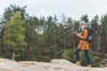 Woman with photo camera in forest Royalty Free Stock Photo