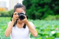 Woman photo grapher taking photo