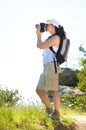 Woman photographer in the campaign Royalty Free Stock Photo