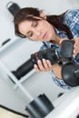 woman photographer checks lens