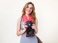 Woman photographer holding old 35mm film camera Royalty Free Stock Photo