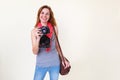 Woman photographer holding old 35mm film camera Royalty Free Stock Photo