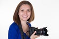 Woman photographer holding reflex camera dslr smiling Royalty Free Stock Photo