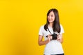 Woman photographer holding vintage digital mirrorless photo camera on hands Royalty Free Stock Photo