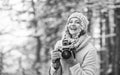 Woman photographer. Inspiration create something special. Spend day outdoors. Girl with vintage camera in snowy nature