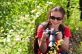 Woman photographer in nature Royalty Free Stock Photo