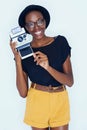 Woman, photographer and portrait in studio with retro camera, creativity and happy artist with creative talent. African