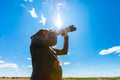 Woman photographer shooting the sky Royalty Free Stock Photo