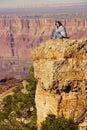 Woman photographer taking last pictures at the South Rim