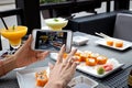 Woman photographing food Royalty Free Stock Photo