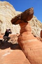 Woman Photographing a Paria Rimrocks Red Toadstool