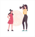 A woman photographs a child on a camera with a flash. Mother takes a photo of her teenage daughter. Cartoon characters