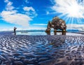 The woman photographs the natural wonder